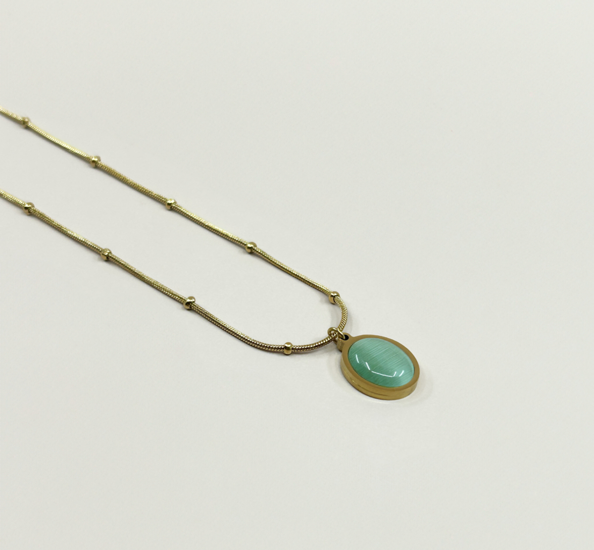 Çelik Gold Renk Oval Yeşil Kedi Gözü Taşlı Dorika Zincir Kolye - Image 2