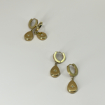 Çelik Gold Renk Taşlı Kuzey Yıldızı Detaylı Sallantılı Küpe